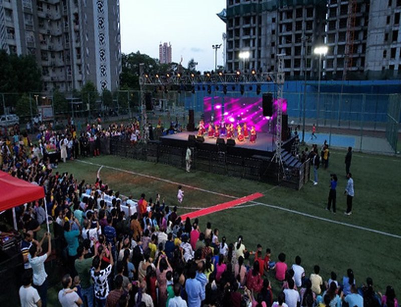 Outdoor live event with stage and audience