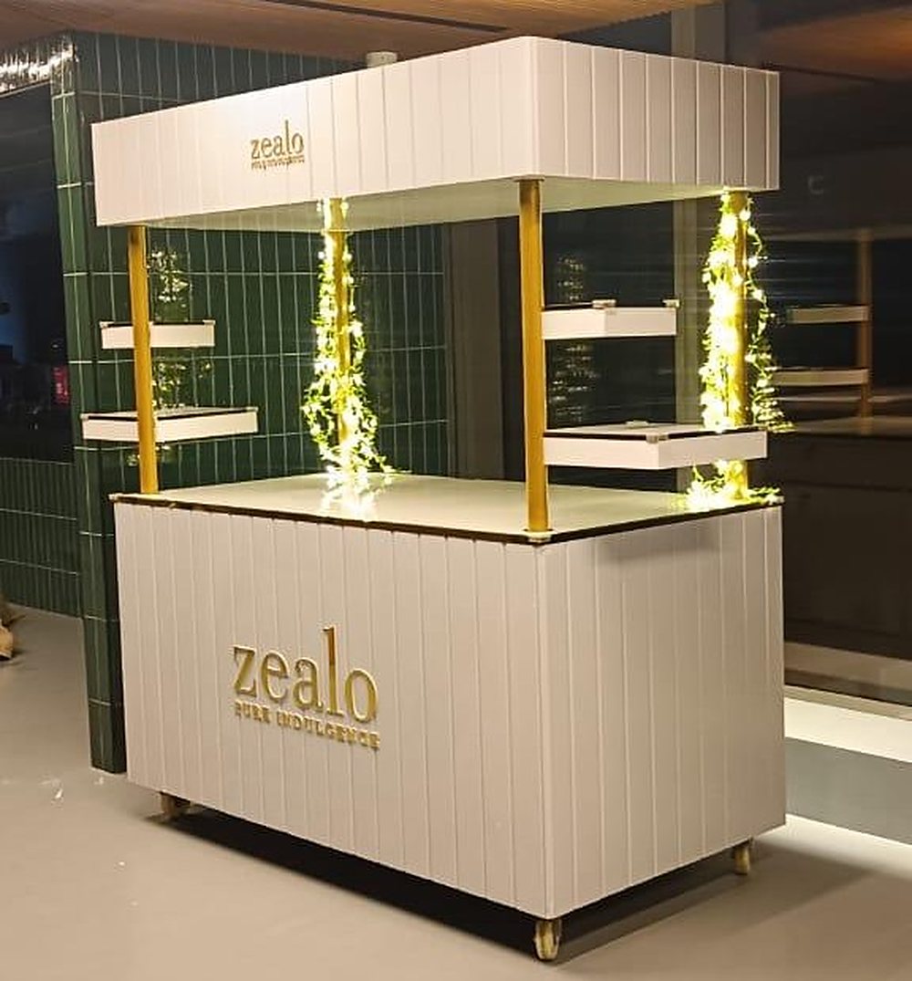 Custom fabricated retail kiosk with warm lighting